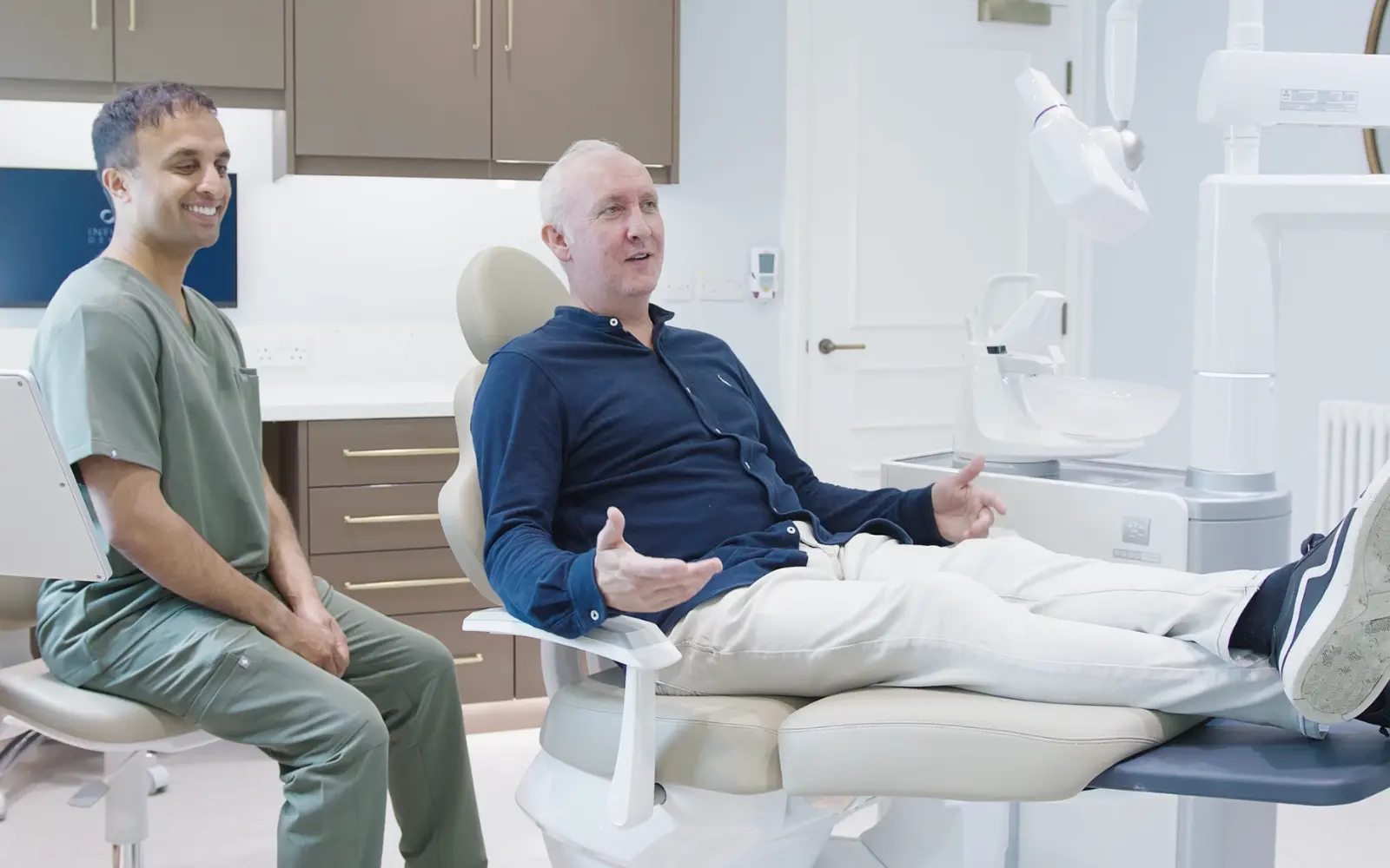 Woman smiling confidently after dental implant treatment